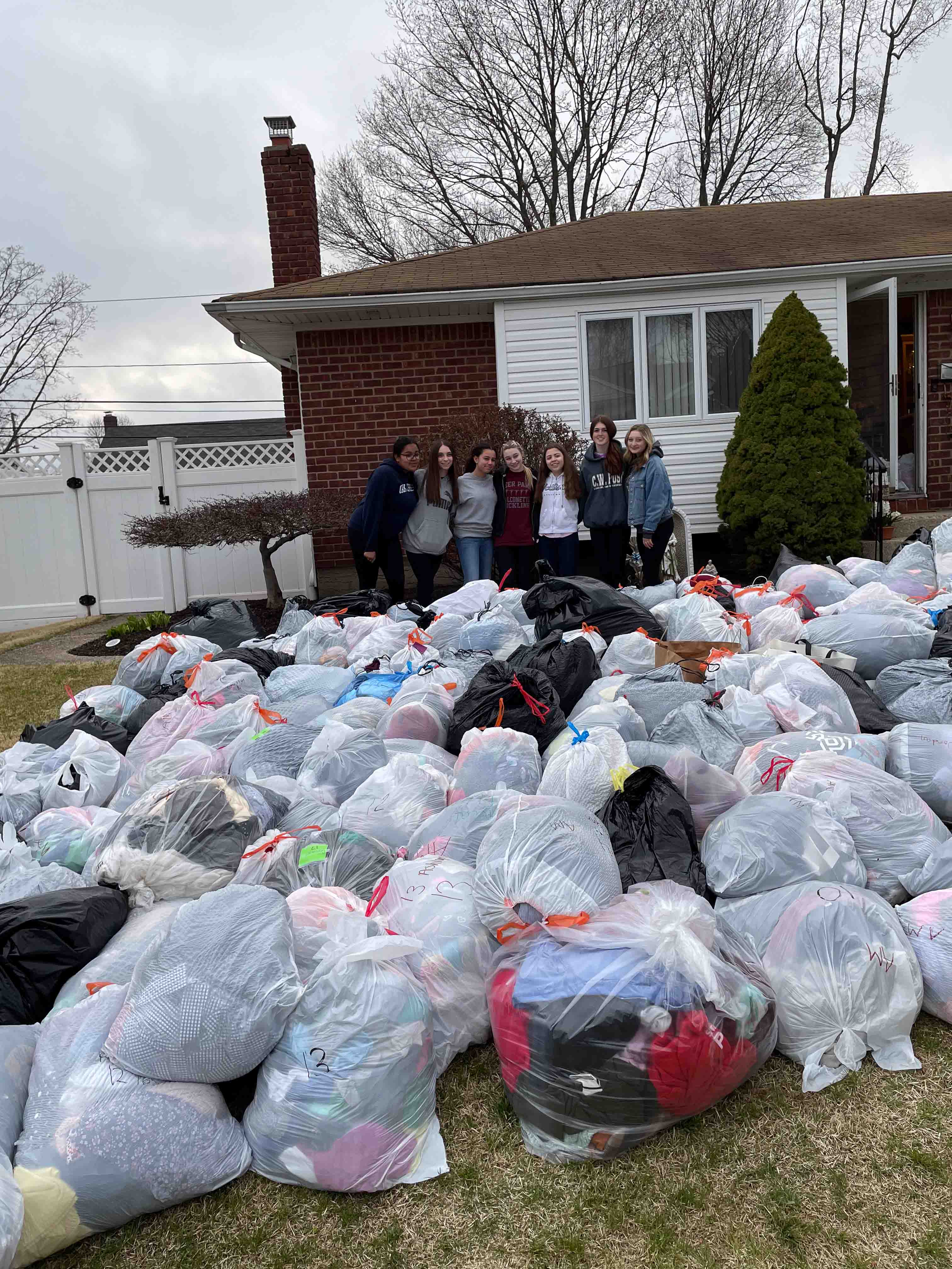 Clothing drive truck picking up donations