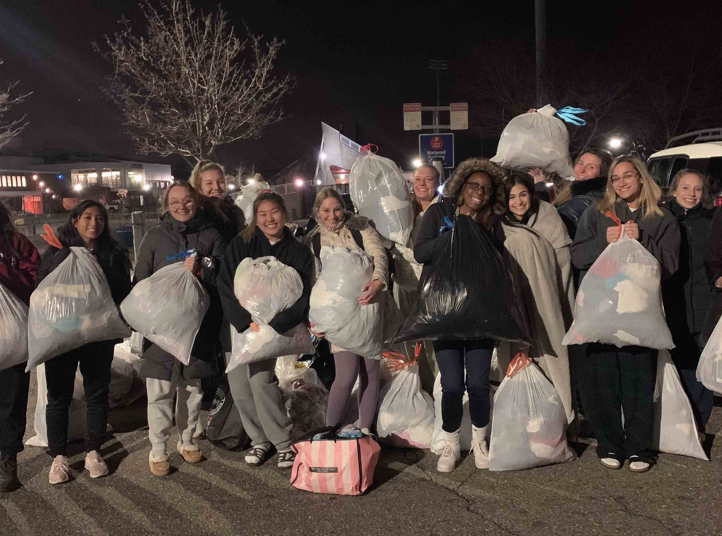 Volunteers collecting used clothing donations