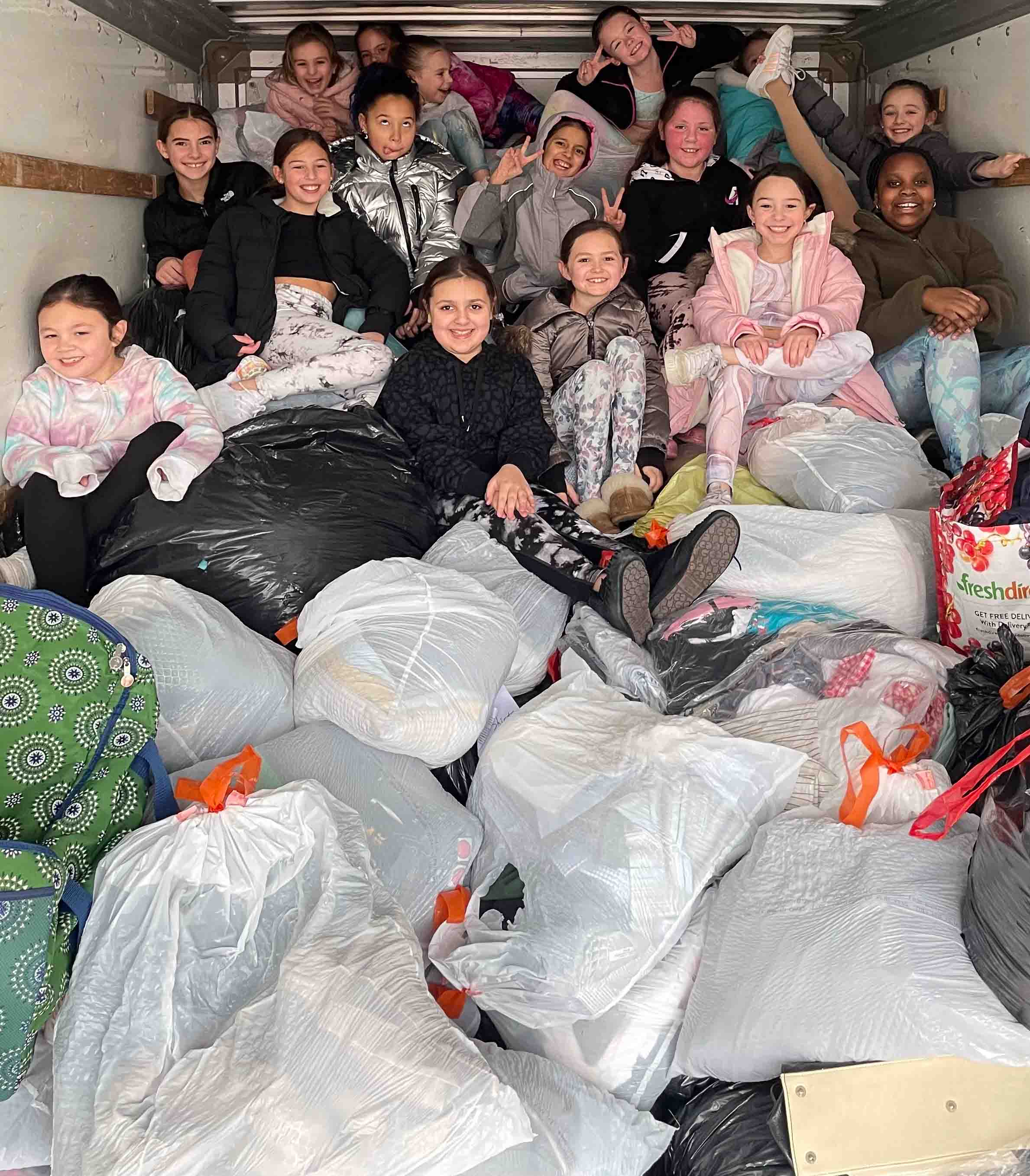 Clean, bagged clothes ready for pickup