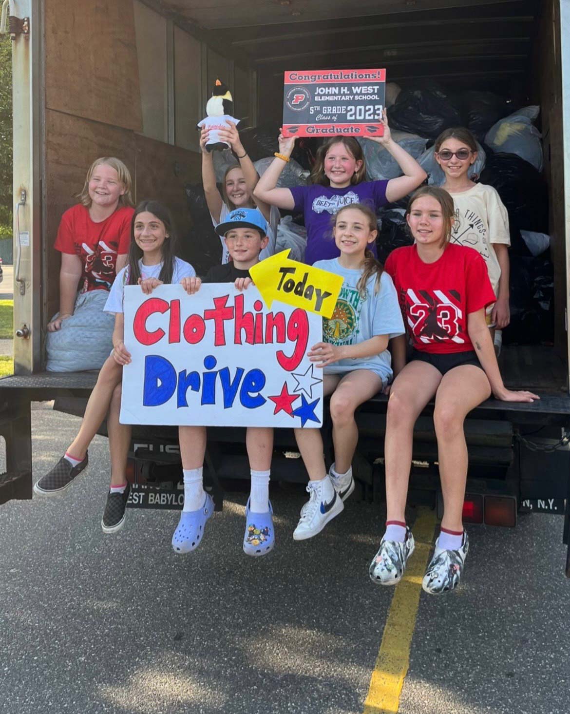 Sports team fundraiser with clothing drive