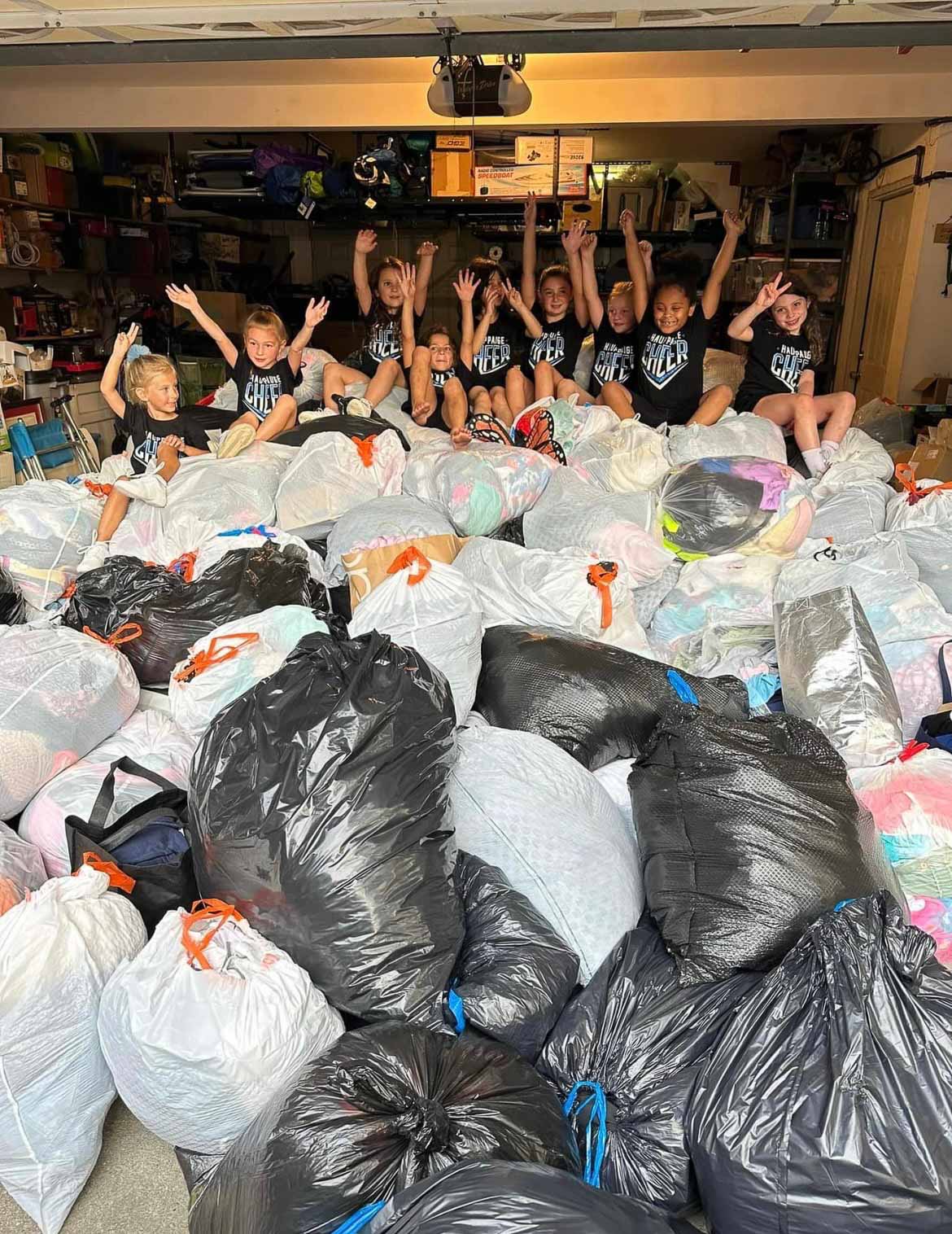 Community members supporting clothing drive