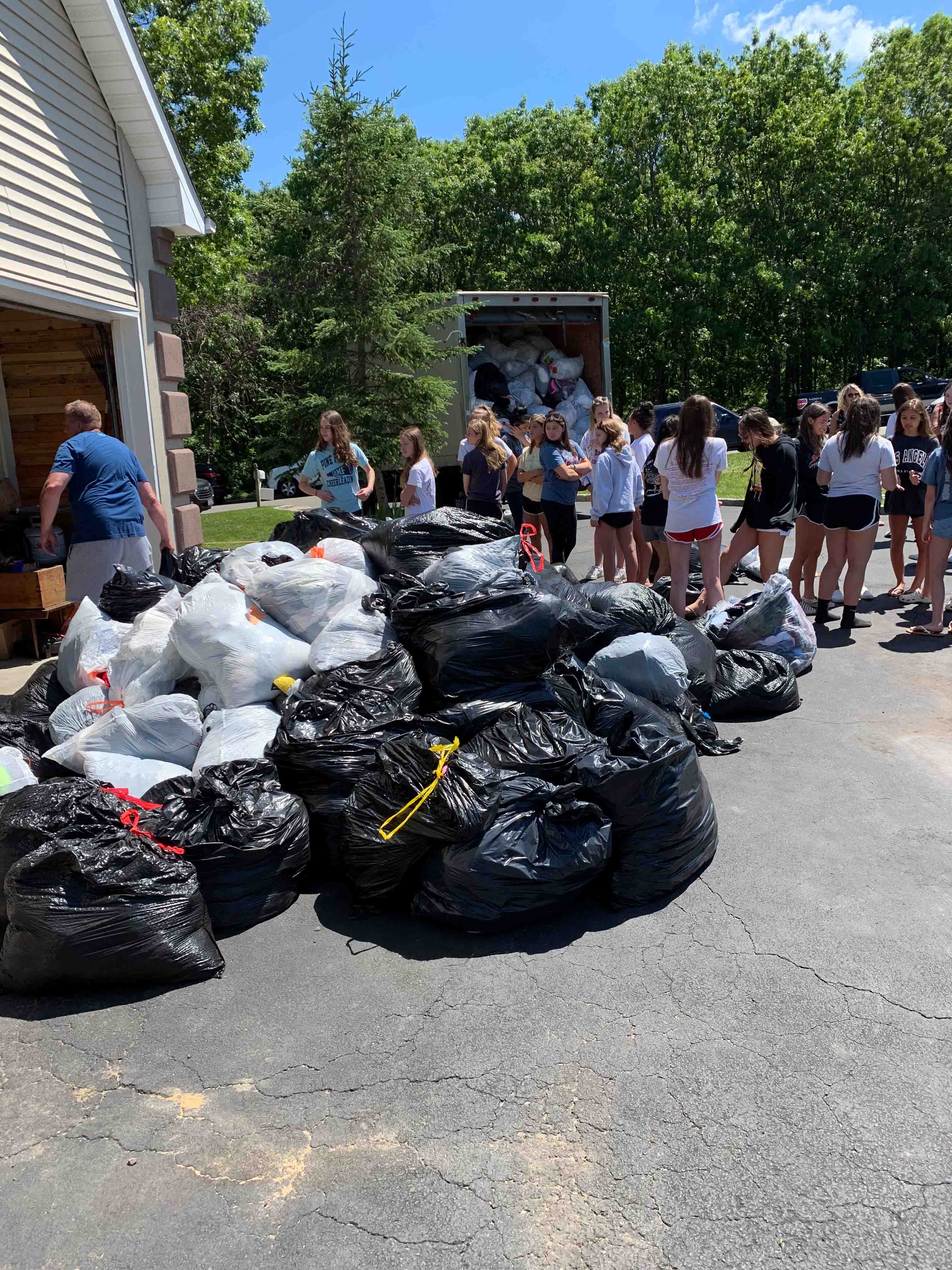 Donated clothing bags ready for pickup