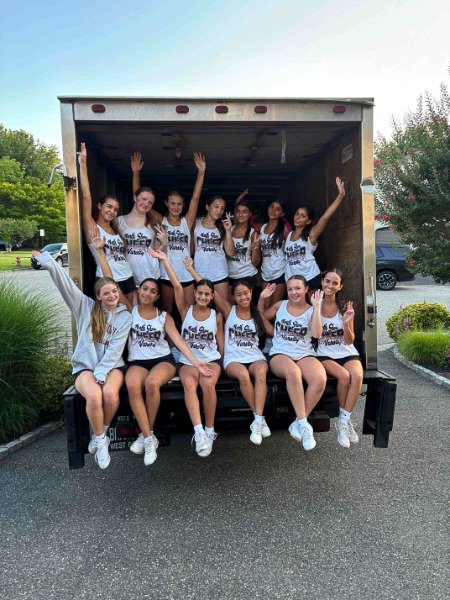 Go Green truck parked at a clothing drive location ready for collections
